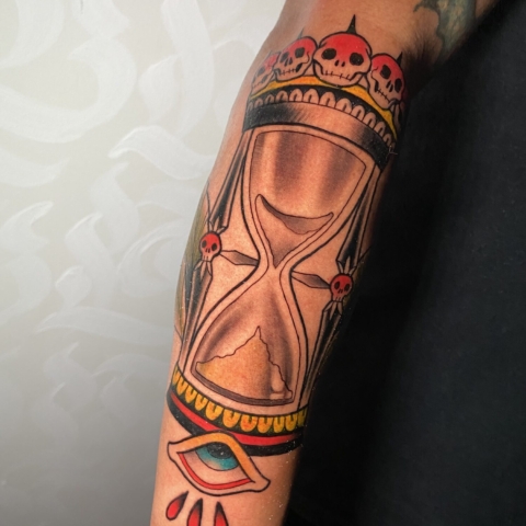 Hourglass Tattoo in traditional tattoo style on arm picture